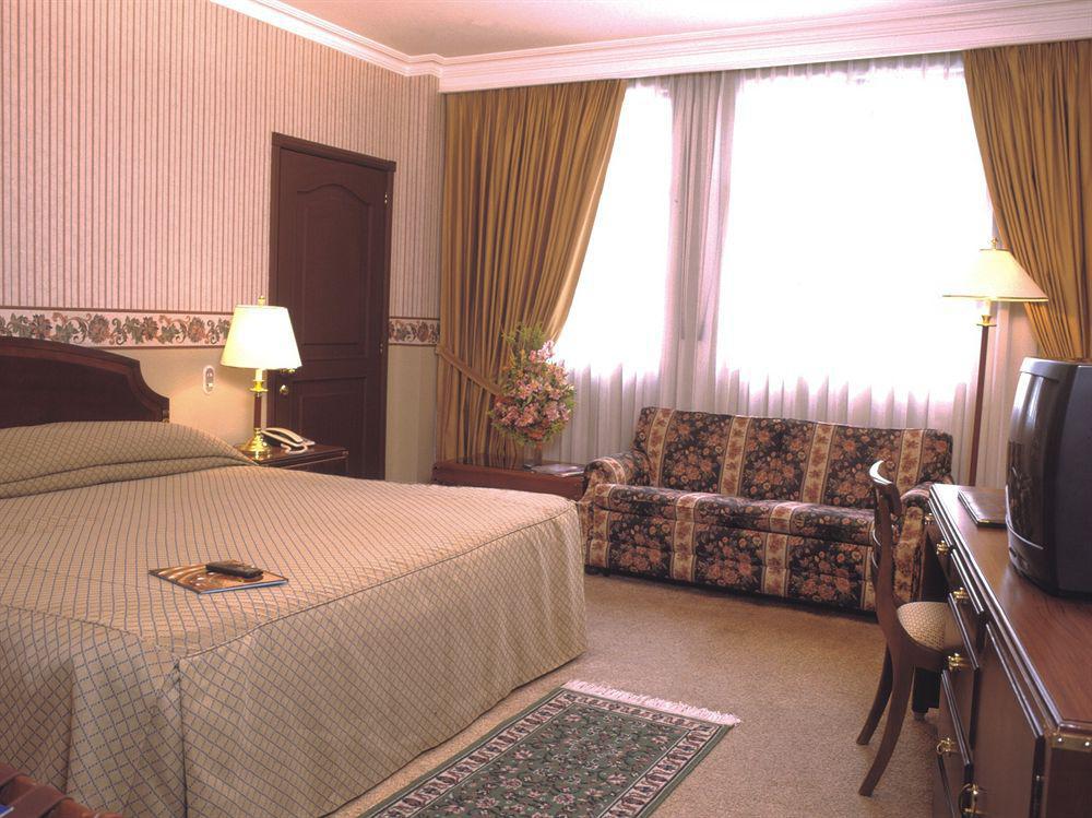 Hotel Dann Carlton Cali Pokoj fotografie